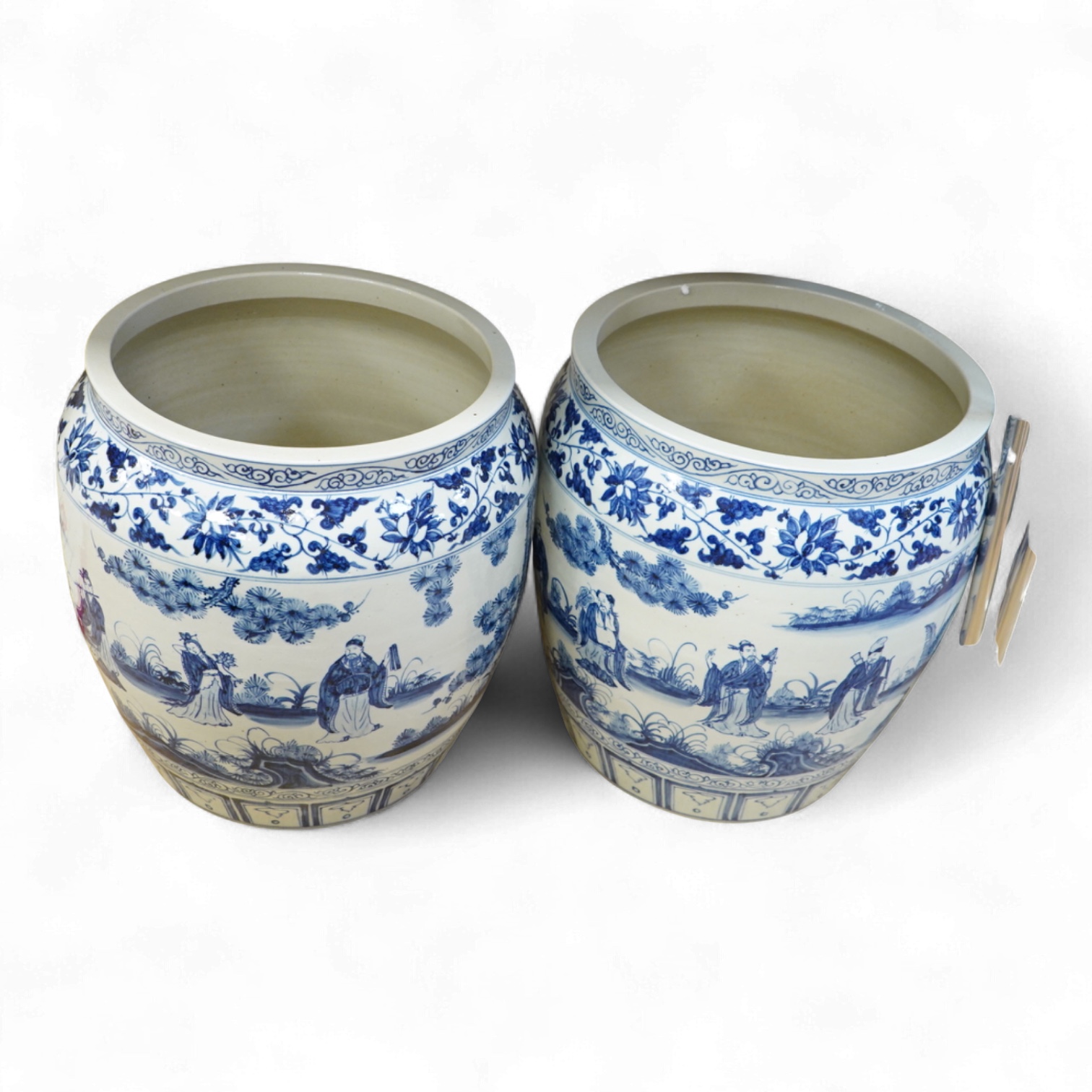 A large pair of Chinese blue and white planters, 43cm high.